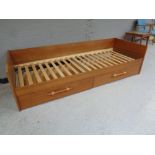 A Continental teak day bed