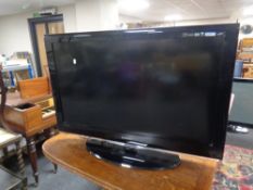 A Samsung 40" LCD TV with remote