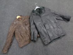 A gent's Hugo Boss brown leather jacket together with a further black leather 3/4 length coat