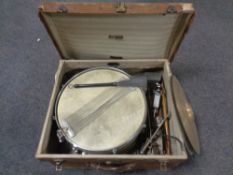 A vintage snare drum on stand with cymbals in case together with a further folding music stand and