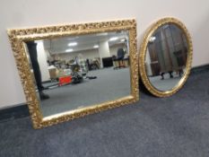 A rectangular gilt framed bevel edged mirror together with a further oval gilt framed bevel edged