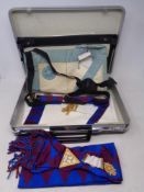 A Freemasons briefcase containing belts,