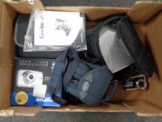 A box of Goodmans and Philips portable DVD players in carry cases,