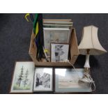 A brass and marble table lamp with shade together with a box containing assorted framed pictures