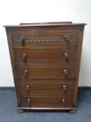 A 20th century oak 5 drawer chest