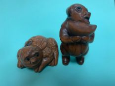 A Japanese carved fruitwood netsuke - Giant Turtle, together with one other.