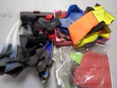 Two boxes containing a quantity of diving equipment to include flippers,