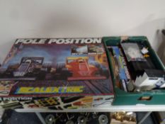 A Scalextric pole position racing set (boxed) together with a further box containing accessories