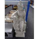A concrete garden figure - Indian Goddess,