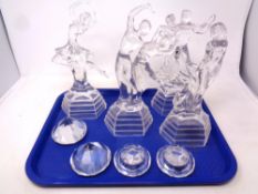 A tray of four contemporary glass figures of dancers and four paper weights