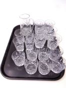 A tray of cut glass brandy glasses and jug