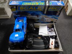 A Scalextric continental sports car racing set together with a monster truck