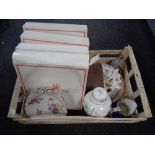 A crate containing assorted ceramics to include boxed Spode cabinet collection shell dishes,