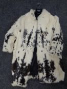 A coney fur 3/4 length coat