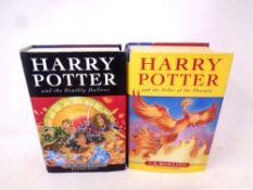 Two first edition Harry Potter books,