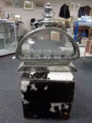 A horse hair upholstered cube stool together with an ornate white metal tea light holder