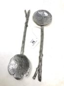 A pair of naturalistic silver plated spoons in the form of twigs.