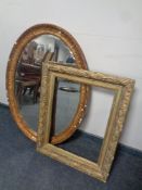 An Edwardian oval gilt framed bevel edged mirror together with a antique gilt composite frame