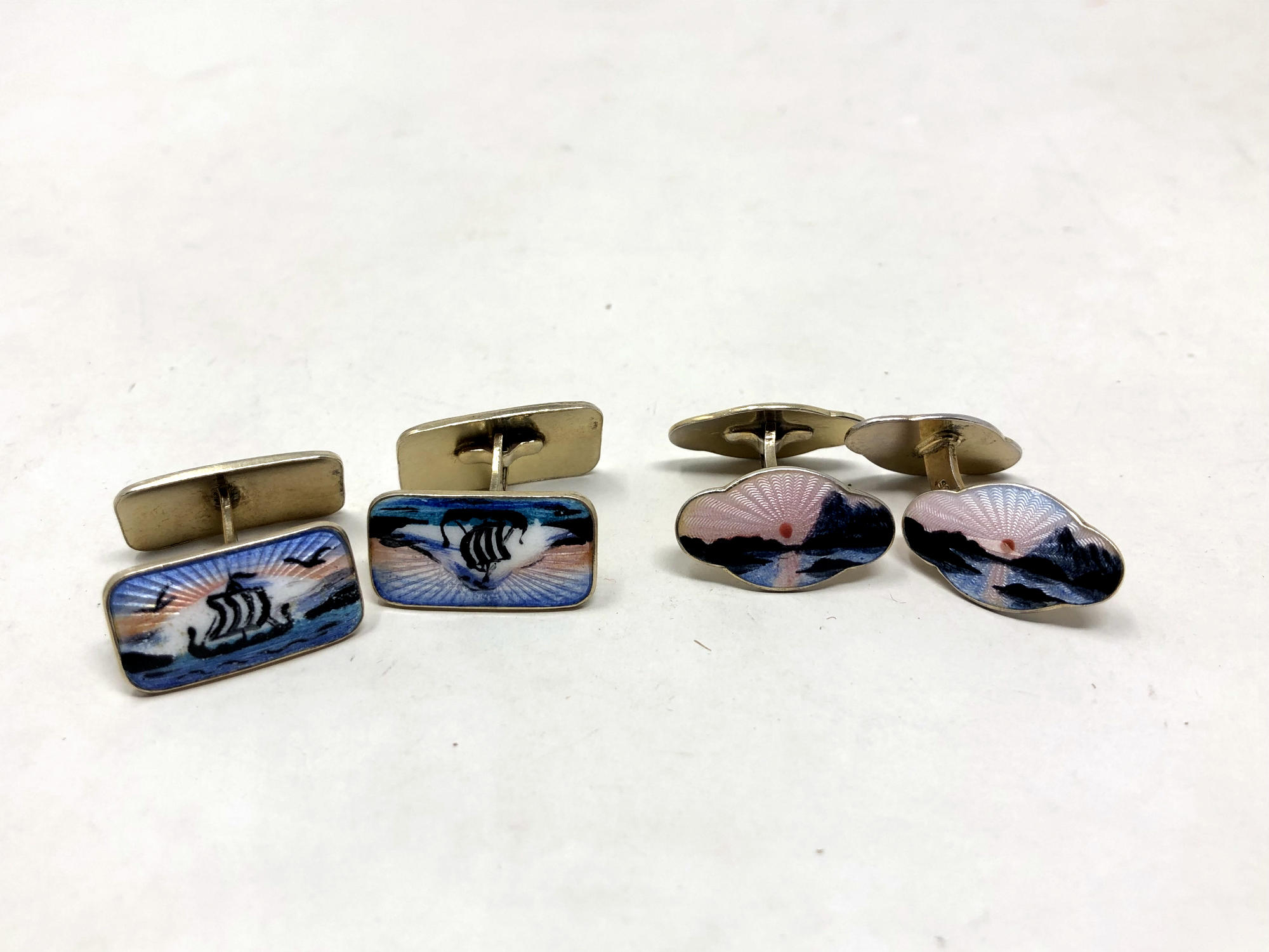 Two pairs of Norwegian silver and enamel cuff links