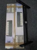 A Casio Tone Bank C7-656 electric keyboard (boxed) together with a keyboard stand