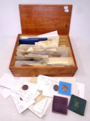 A box containing 20th century English and continental coins, foreign bank notes,