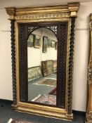 A good quality colonial style mirror with pillared sides 121 cm x 199 cm,