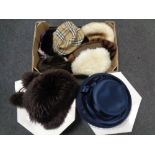 A box and two John Lewis hat boxes containing a quantity of lady's hats to include Burberry and fur