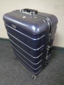 A Santa Barbara Polo and Racquet Club hard shell luggage case