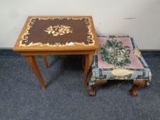 A 19th century beaded footstool on claw and ball feet together with a musical occasional table