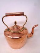 A Victorian copper kettle