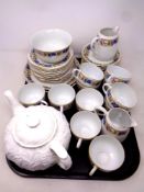 A tray of continental blue and gilt tea china together with a Coalport Countryware teapot.