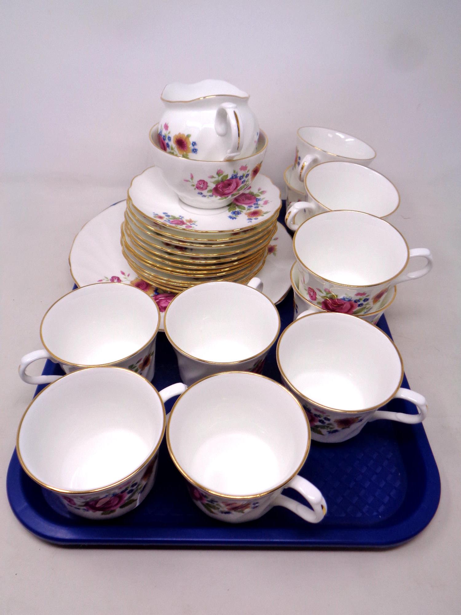 A tray of 26 pieces of Royal Victoria Summer Rose tea china