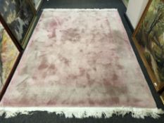 A Chinese fringed pink carpet 230cm x 168cm