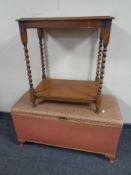 A oak barley twist occasional table together with a pink loom storage Ottoman