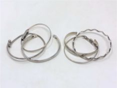 Six various silver bangles CONDITION REPORT: 73g gross.