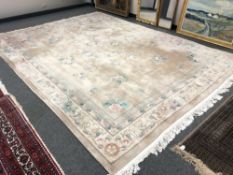 A Chinese floral carpet on cream ground 375cm x 276cm