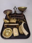 A tray of a set of antique Avery kitchen scales with weights, brass swan ornaments, tusks,