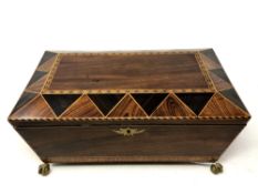 A Victorian inlaid mahogany and marquetry ornate table box, on claw and ball brass feet,