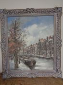 A continental school oil on canvas, Amsterdam canal scene, in ornate frame,