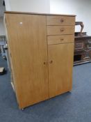 A mid 20th century Schreiber furniture combination wardrobe