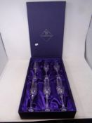 A boxed set of six Edinburgh Crystal champagne flutes,