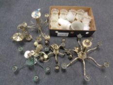 Six assorted brass and metal chandeliers together with a box containing glass light shades