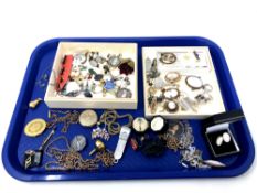 A tray of antique and later costume jewellery, gilt chains,