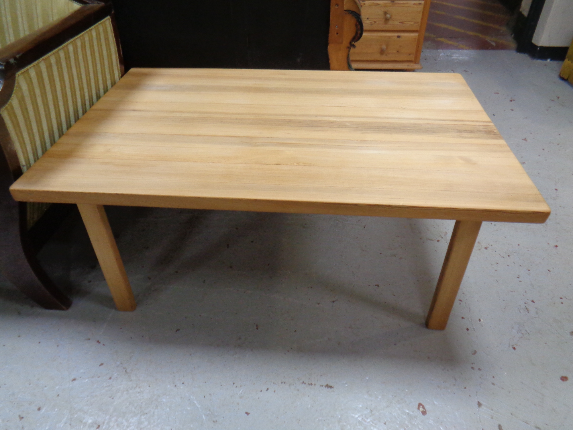 A rectangular pine coffee table
