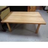 A rectangular pine coffee table