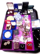 A tray containing costume jewellery, silver dress ring, earrings,