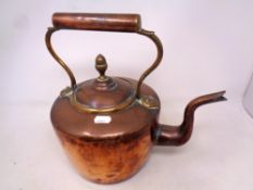 A Victorian copper and brass kettle