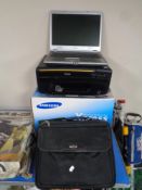 A Kodak printer together with a Fujitsu Siemens laptop computer in bag