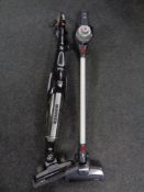 A Hoover cyclone hand held cordless vacuum together with a further Hoover,