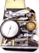 A tray containing Bakelite cased barometer loose cutlery etc